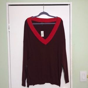 Medium Express oversize deep V neck sweater.